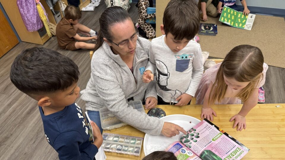 4-C staff coaching and modeling in a child care classroom.